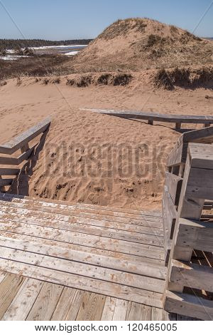 Piled Sand On Wooden Stairs