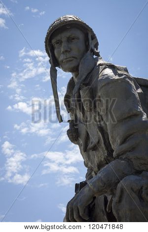 FAYETTEVILLE, NC - JUNE 28, 2015: Close up view of the Iron Mike statue depicting a WWII era Airborne trooper at the Airborne and Special Operations Museum was originally displayed at Fort Bragg.
