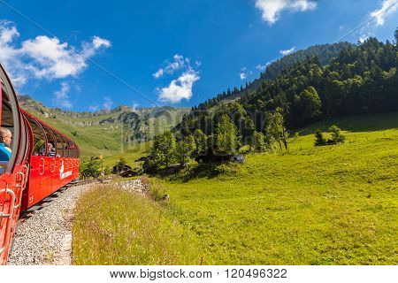 Sightseeing By The Steam Train In Swiss Alps
