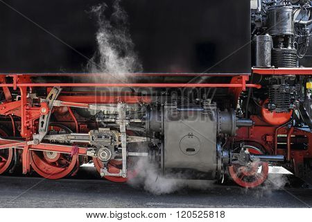 Vintage steam train leaving the station