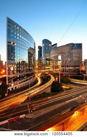 PARIS, FRANCE - MAY 13: Contemporary architecture in la Defense business district on May 13, 2015 in Paris. With the population of 2M, Paris is the capital and most-populous city of France.