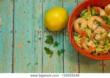 Spiralized Zucchini With Jumbo Shrimp On Wood Board