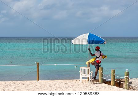 Lifeguard Patrolling The Beach