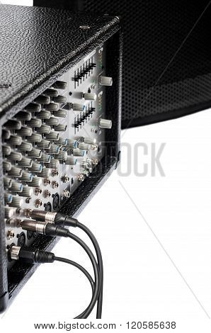 Close-up of guitar amplifier with jack cable
