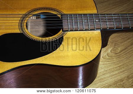 Body Part Of Yellow 12 String Guitar
