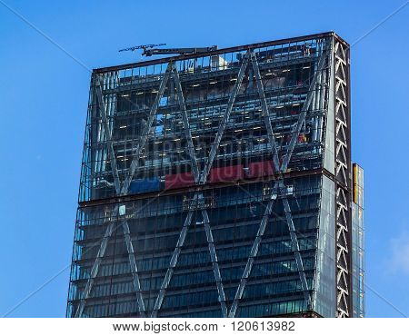 LONDON UK - JUNE 6 2015: The Leadenhall Building or The Cheesegrater building on blue sky background. View from Trinity square