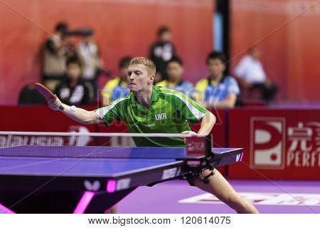 KUALA LUMPUR, MALAYSIA - MARCH 01, 2016: Yevhen Pryshchepa of Ukraine plays return shot in his match in the Perfect 2016 World Team Table-tennis Championships held in Kuala Lumpur, Malaysia.