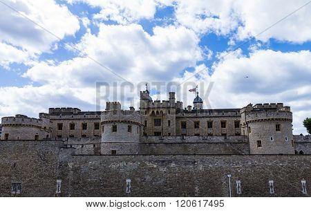 Her Majesty's Royal Palace and Fortress Tower of London historic castle on the north bank of the River Thames in central London - a popular tourist attraction.