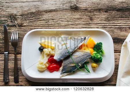 fish fillet with stewed vegetables. lenten food