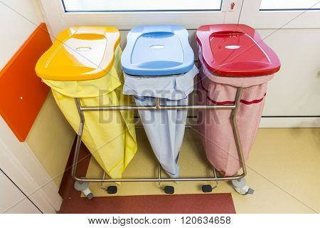 Three Recycle Bins In A Hospital