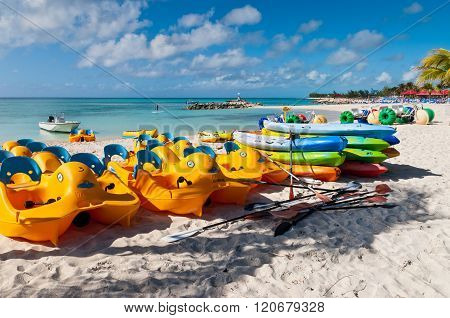 Colorful Water Sport Equipments On The Beach - Bahamas