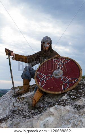 Knight Sitting On A Rock