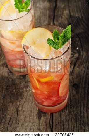 Cranberry Cocktail With Ice, Mint, Lemon And Apple