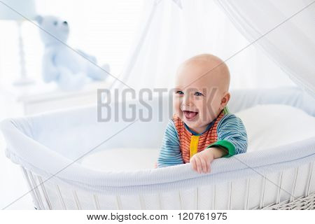Cute Baby In White Nursery
