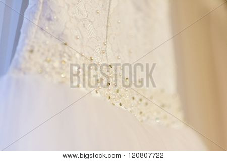 Wedding dress waiting bride. Exquisite lace details.
** Note: Shallow depth of field
