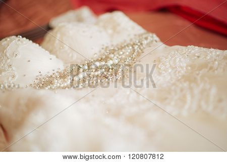 Wedding dress waiting bride. Exquisite lace details.
