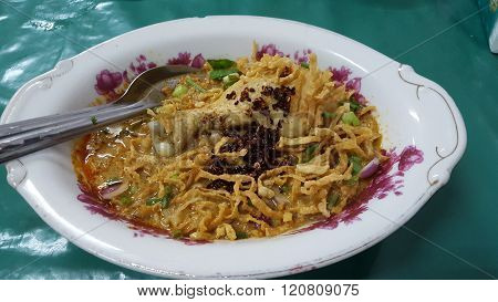 spicy Chinese noddle with chicken leg soup