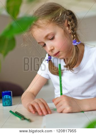 Little girl drawing with pencil at home.
** Note: Soft Focus at 100%, best at smaller sizes