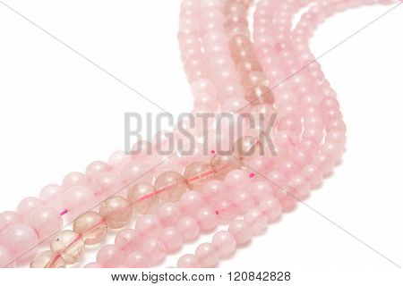 Strings of pink quartz