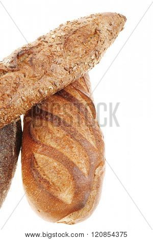 different rye and white flour bread loaf with french baguette isolated on white background