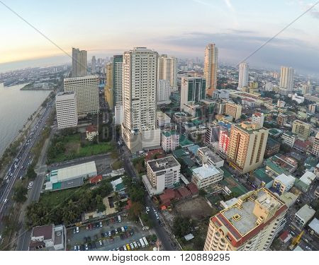 Manila, Philippines - January 19, 2015: Roxas Boulevard at evening, high-rise buildings skyscrapers in Manila, Philippines .