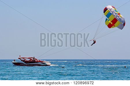 Parasailing In A Blue Sky