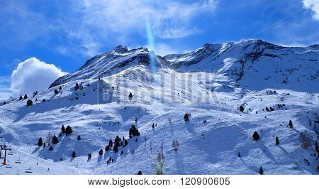 Snowy mountains and blue sky.