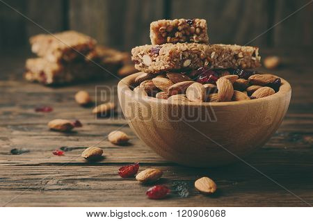 Cereal Bar With Almond And Berry On Thw Wooden Table