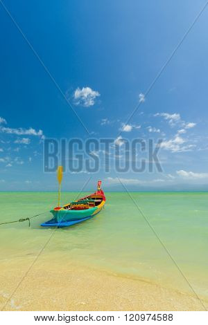 Traditional thai longtail boat at famous sunny Long Beach, Thailand, Koh Phi Phi Don, Krabi province, Andaman sea