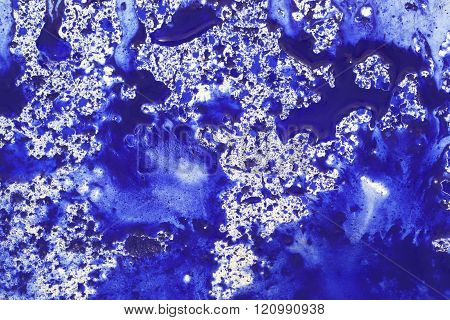 Blot of blue paint.