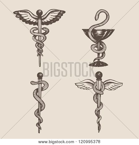 Hand drawn illustrations of Caduceus. Vector elements