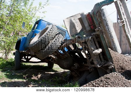 A Truck With A Load Fell Down