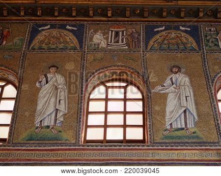 RAVENNA, ITALY - JUNE 15, 2017: Mosaics in the Basilica of Sant'Apollinare Nuovo which was erected in VI century. Early Christian Monuments of Ravenna is listed as UNESCO World Heritage