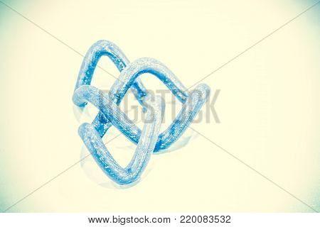 Abstract object of a blue color printed by 3d printer on white background. Fused deposition modeling, FDM. Progressive modern additive technology. Concept of 4.0 industrial revolution