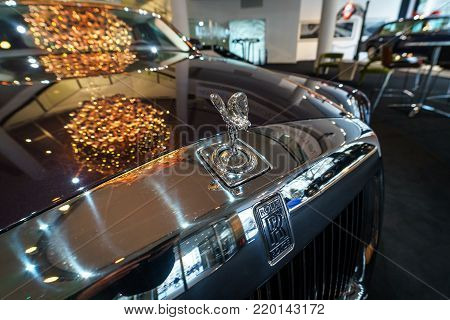 BERLIN - DECEMBER 21, 2017: Showroom. The emblem "Spirit of Ecstasy" of a full-size luxury car Rolls-Royce Phantom VII Series II Extended Wheelbase. Since 2012.