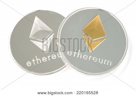 Two Real coin of cryptocurrency Silver Ethereum isolated on white background