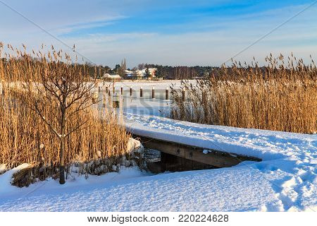 Winter with snow at the port in Prerow, Germany.