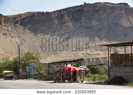 Areni, Armenia, September 18, 2017: Sales of fruit, juice and wine along roads in the area of the oldest wine cellar in the village of Areni, Armenia