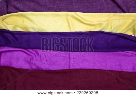 Colorful female tippet scarf isolated on white background. Textile abstract background.