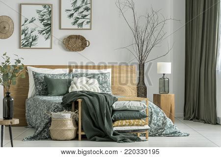 Hat And Basket Above Bed