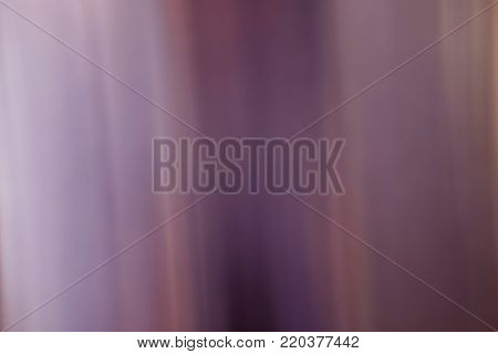 Shiny stainless steel in pink tones with soft vertical lines.