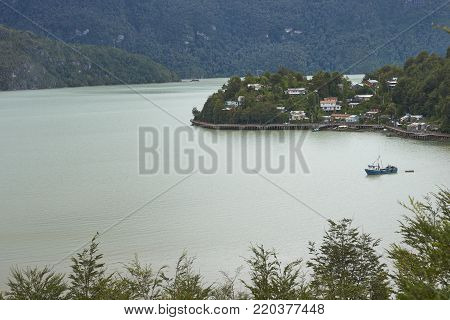 Coastal village of Tortel built into the steep hillsides of northern Patagonia in Chile.