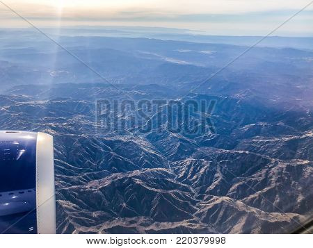 Aerial View Of The Desert And Snow-capped Mountains In Colorado