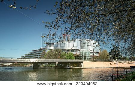 STRASBOURG, FRANCE - APR 15, 2017: European Court of Human Rights building and Ill River in Strasbourg, France