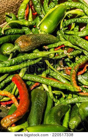 Chilli peppers in a pile making a background.