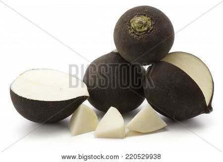 Black radish set isolated on white background three bulbs one cut open one half and three peel pieces