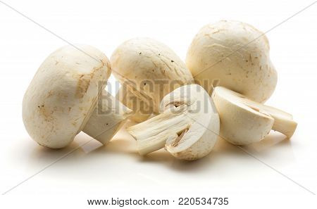 Champignons isolated on white background three whole two halves
