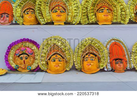 Colored masks of Chhacu dancers, colorful dolls made of clay, handicrafts on display during the Handicraft Fair in Kolkata , earlier Calcutta, West Bengal, India.