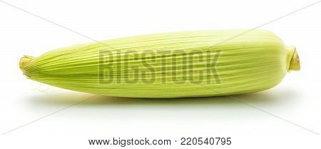 Corn with skin leaves isolated on white background