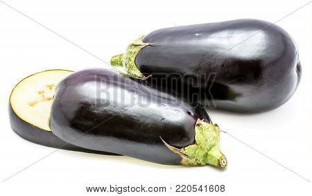 One whole eggplant (aubergine) and two slices isolated on white background